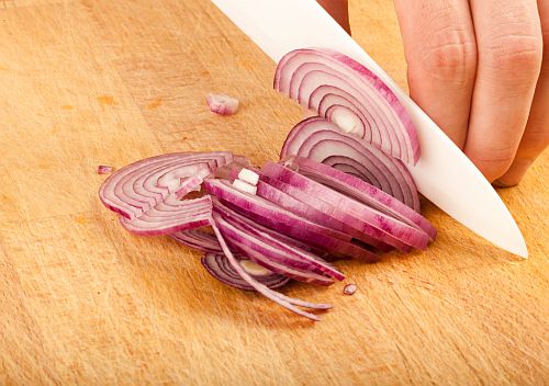 cutting onion with a ceramic knife
