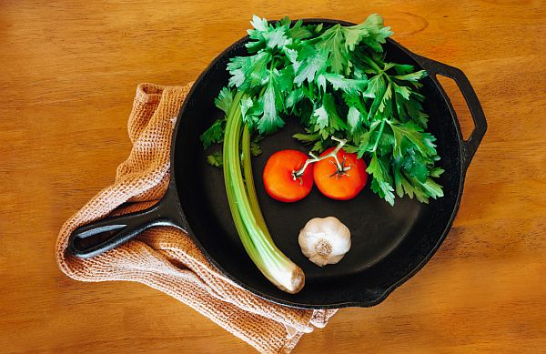 enameled cast iron pan with vegetables