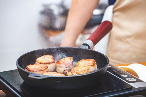 high-heat cooking in a cast iron pan