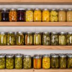 Storage shelves with canned food in mason jars